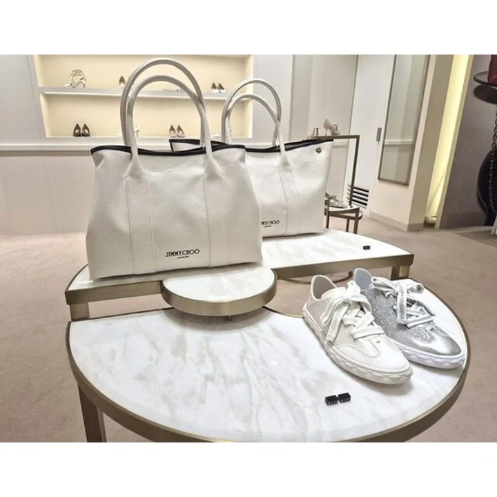 Білі кросівки Jimmy Choo
