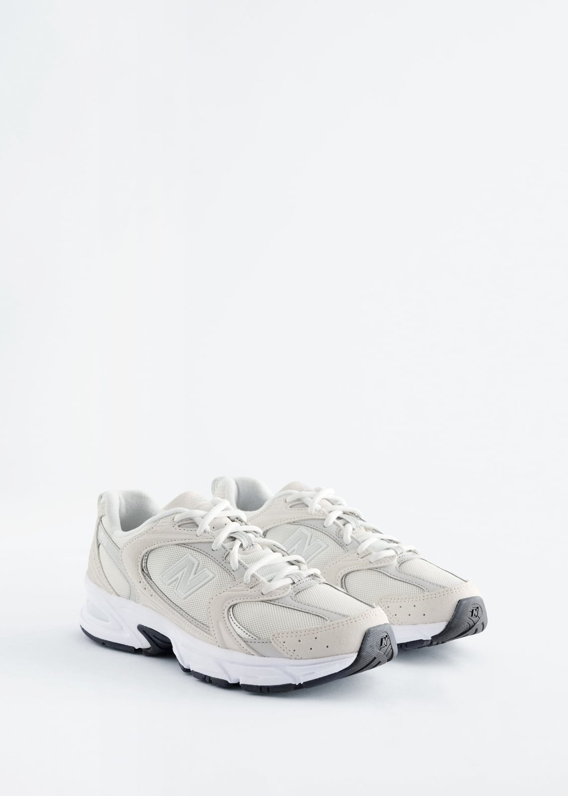Бежево-сірі кросівки New Balance 530